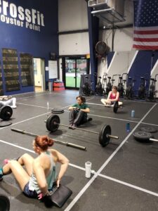 girls working out in social distancing squares